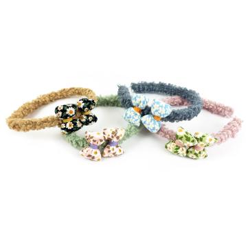 Cerchietto boucle' con fiocco stoffa