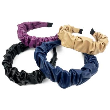 Cerchietto drappeggiato in similpelle
