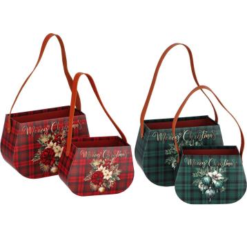 Set 2 contenitori natalizi in cartone stampato con manici in ecopelle d19x8x h13,5 cm e d24x10x h17 cm