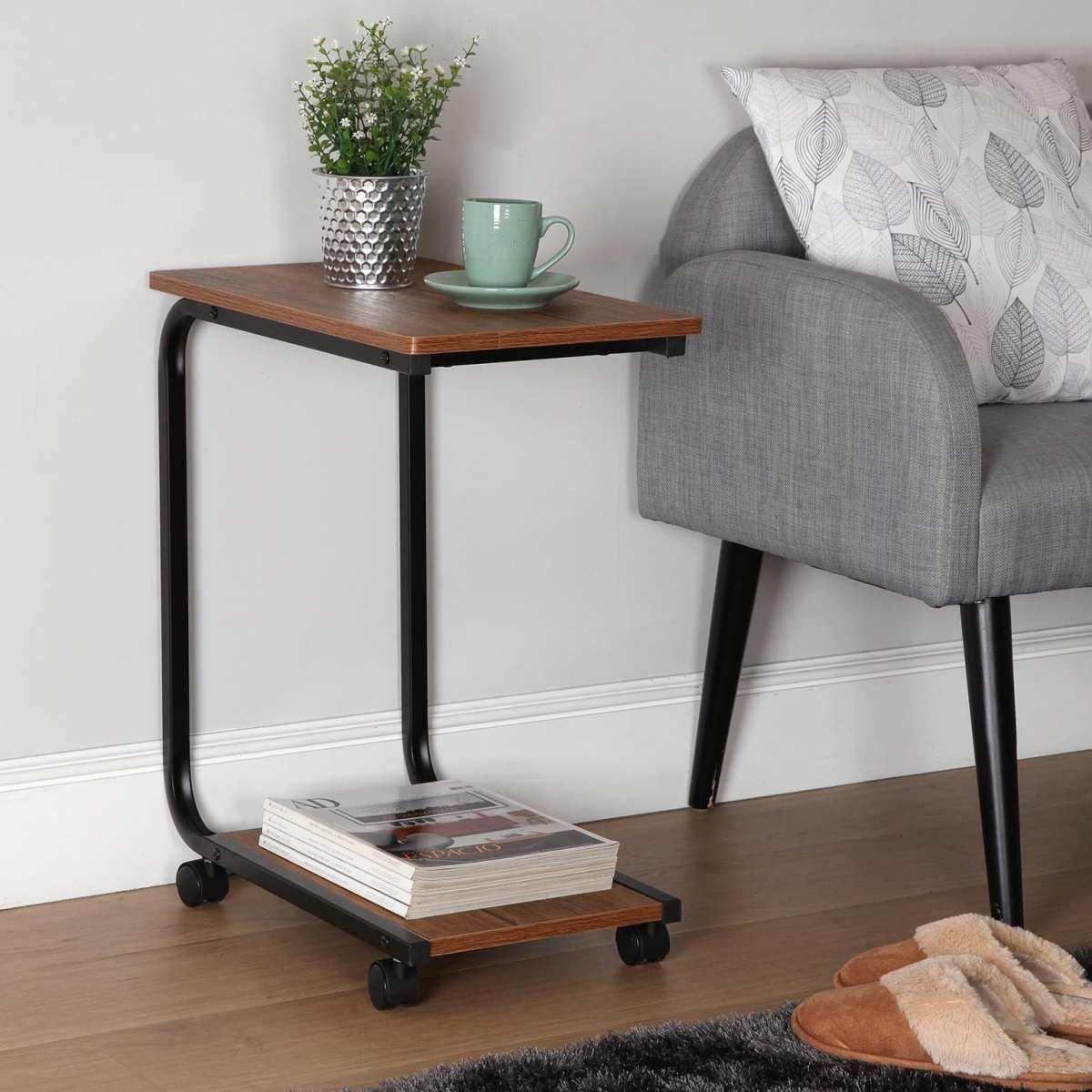 Tavolino nero in legno e metallo con ruote nero