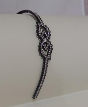Cerchietto plastica doppiocuore strass