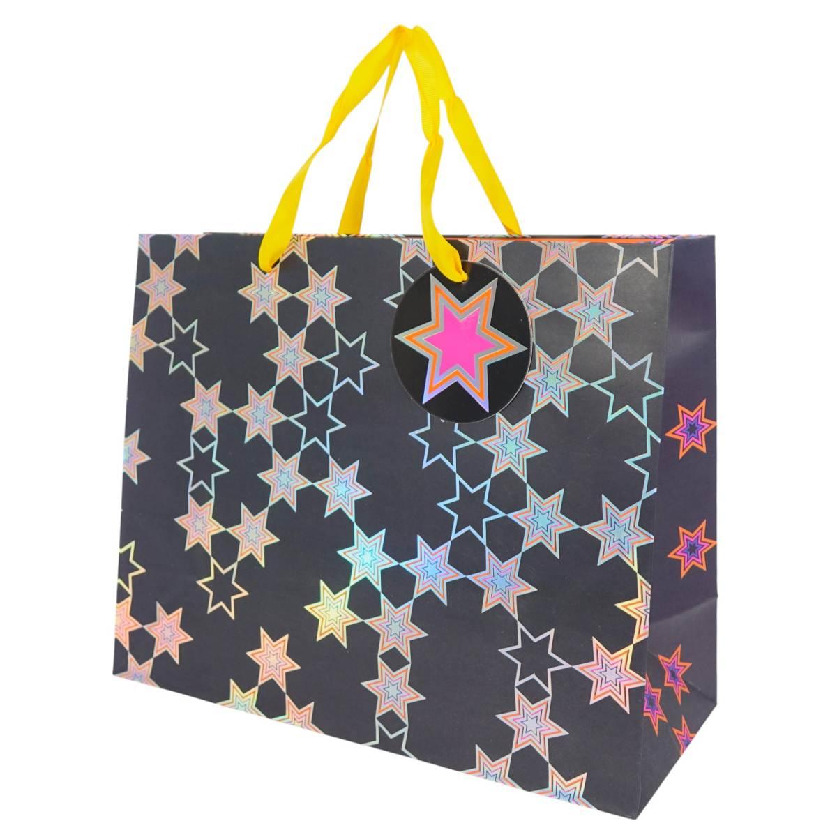 Busta regalo in carta fantasia stelle olografiche