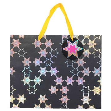 Busta regalo in carta fantasia stelle olografiche