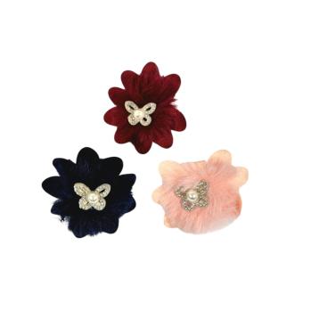 Polsino fiore tessuto con pelo e farfallina strass